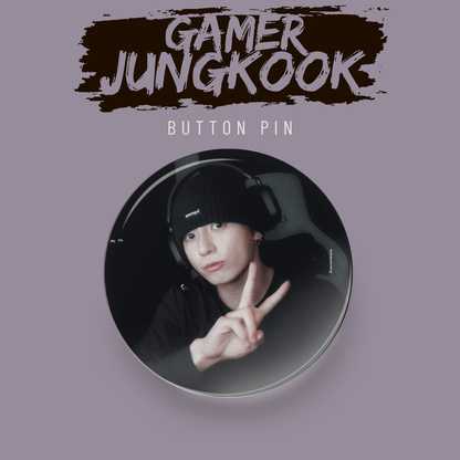 Tsuvishop Button pin with a person wearing headphones and making a peace sign, set against a purple background with 'Gamer BTS Jungkook' text.